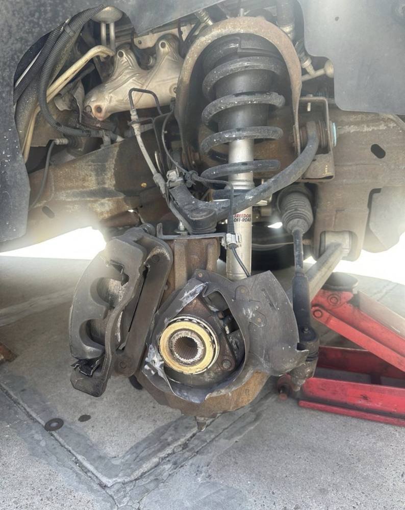 Front strut and hub work on a truck