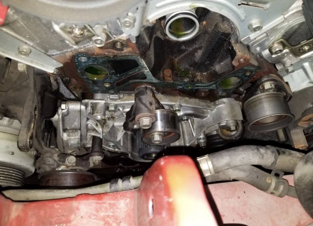 Old water pump out, gasket surfaces exposed